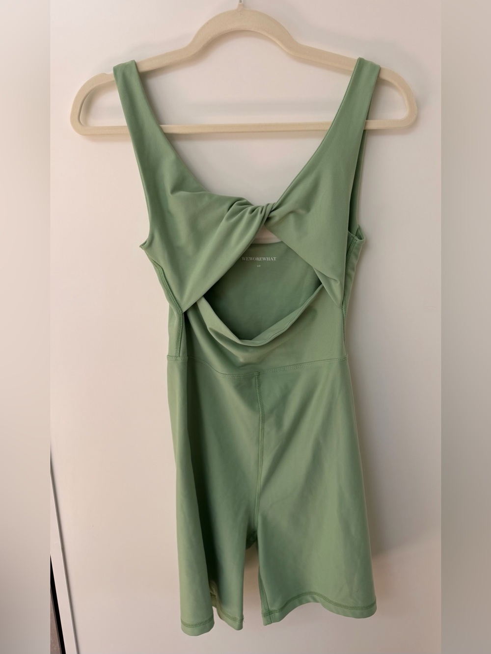 WeWoreWhat sage Green Twist-front small workout Romper